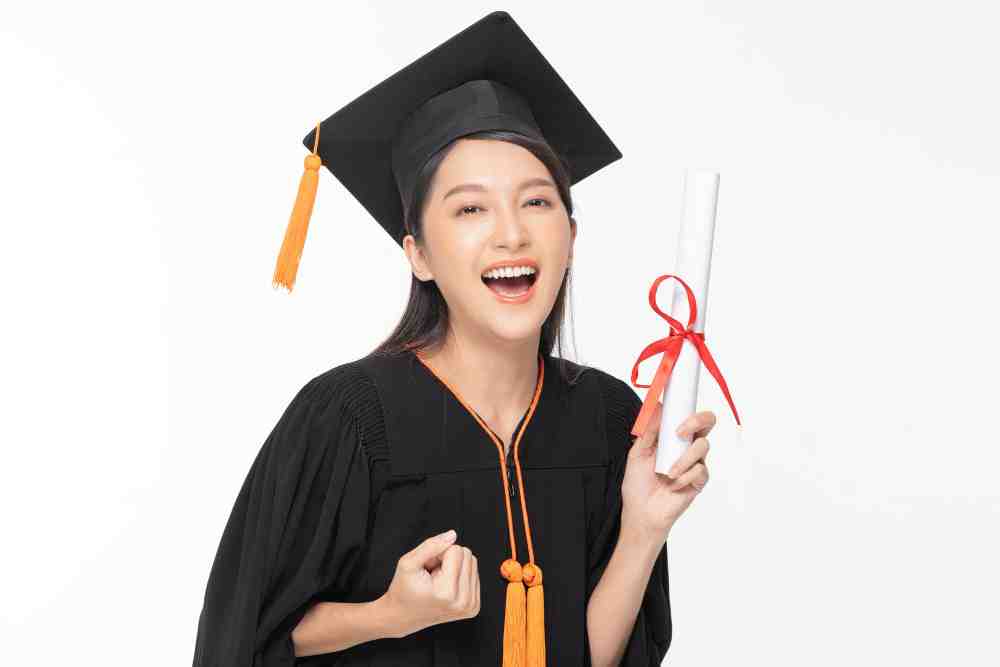 Happy Female Graduate- Study in Japan Concept.